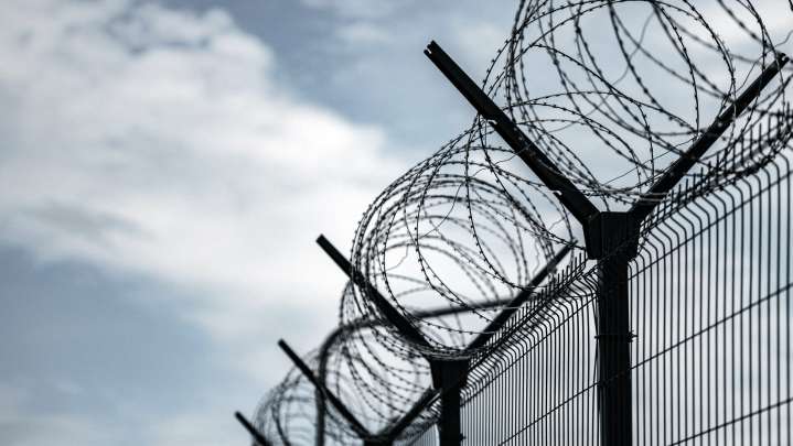 Kansas officer charged with murder after inmate dies by suffocation