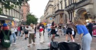 The wholesome moment a Glasgow busker gets the party started on Buchanan Street