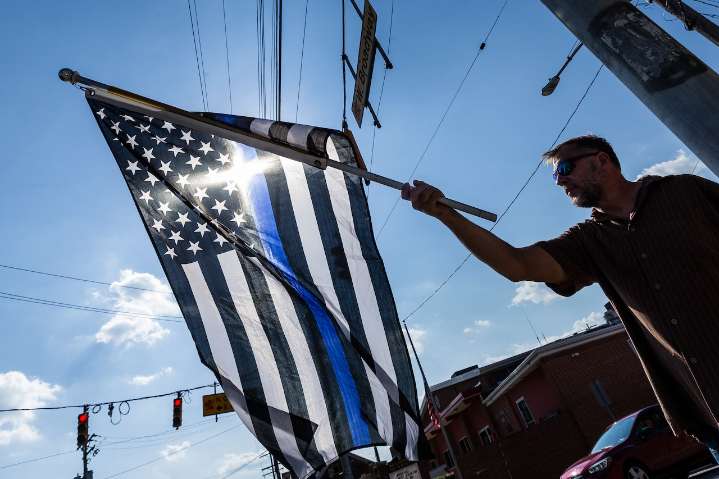 Watch: Procession escorts bodies of slain police officers back to York County following autopsies
