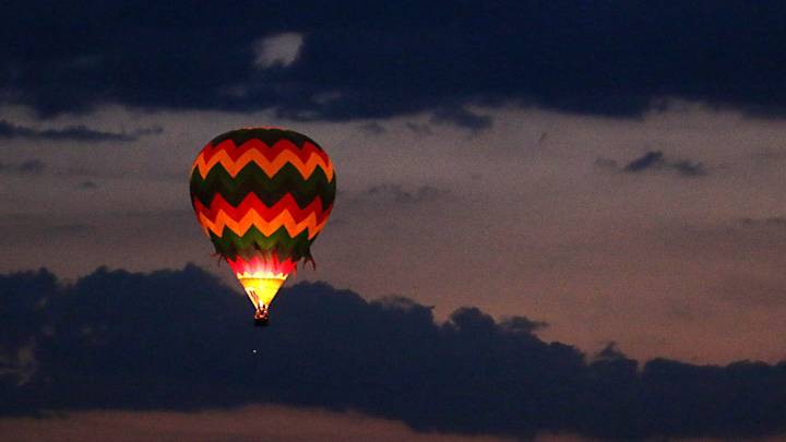 See people and balloons during The Great Reno Balloon Race