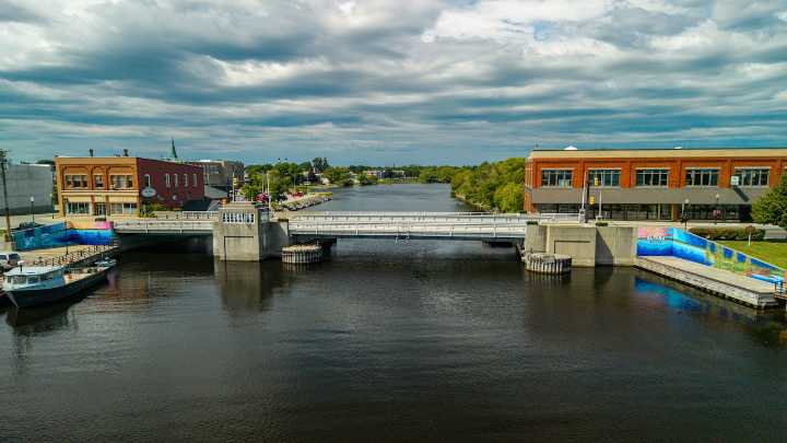 Bridge mural creates vibrant waterway entry into Up North downtown
