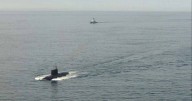 Russian nuclear submarine surfaces near UK territory in 'explosive hazard'