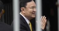 Thailand's Thaksin jailed for a year after court ruling