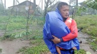 Super typhoon blowing by northern Philippines and Taiwan forces evacuations and closures
