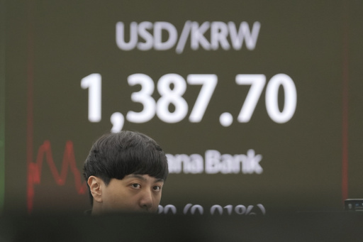 Asian shares mostly rise, cheered by Wall Street rally to more records