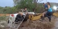 VIDEO: New Mexico deputies save family, dog from rushing floodwater