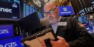 Wall Street ticks toward another record as Tesla vrooms higher