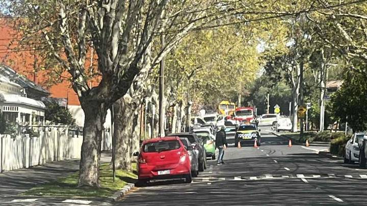 Cyclist killed in crash with truck near Kensington train station in Melbourne