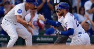Busch stars as the Cubs beat the Cardinals 7-3 to clinch the top NL wild card
