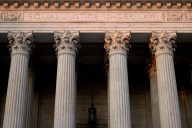 Chief justice keeps Trump funding freeze in place for now