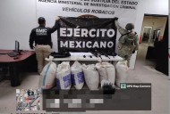 Decomisan costales con mariguana, arsenal y cargadores en Sonora