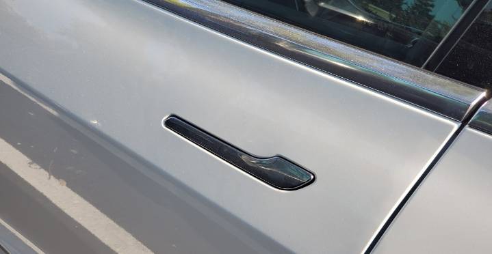 Tesla under investigation for door handles that trap people inside