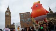 Anti-Trump protesters march in London
