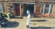 Man arrested following death at property in Ayrshire as forensics scour scene
