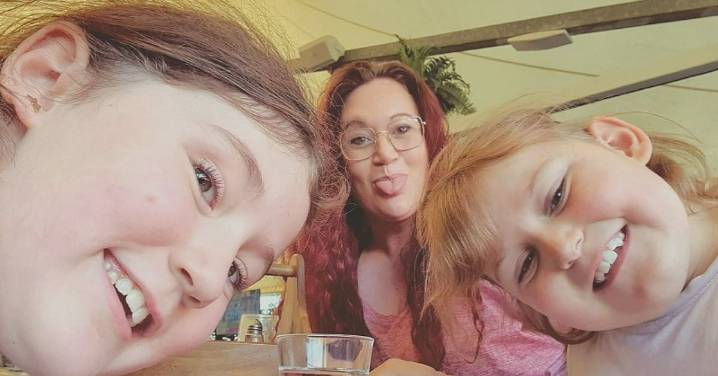 Mum's prison sentence overturned for crash that killed daughters