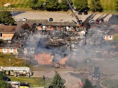 Gunman smashes into Michigan church and opens fire, killing at least 4 and injuring 8
