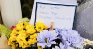 People gather at Ricky Hatton's gym in Hyde to pay tribute to local hero
