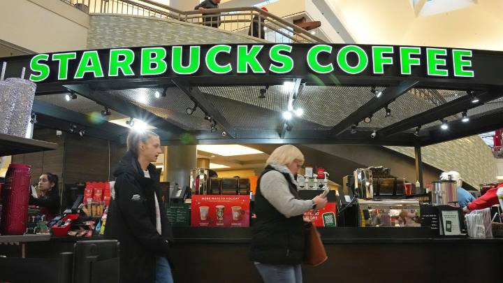 Starbucks to close hundreds of stores, lay off 900 workers as part of turnaround plan