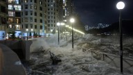 World’s BIGGEST super typhoon this year slams into Hong Kong & washes pair out to sea while lake bursts in Taiwan
