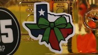 College football teams from Texas honor flood victims with green ribbon sticker