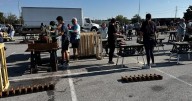 Nonprofit volunteers build beds for local children