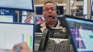 Wall Street pulls further from its records under the weight of pressure from the bond market
