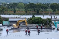 Taiwan: Rescuers Struggle Through Mud In Search For Missing Following Typhoon Ragasa Devastation
