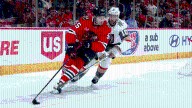Blackhawks defensemen looking 'to grow up fast and win games'