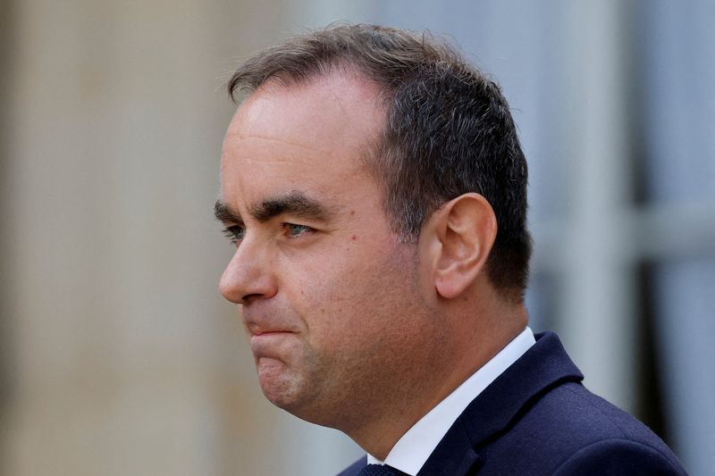 French Socialists press Macron's new government for major budget concessions