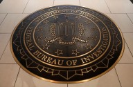 The FBI has fired agents photographed kneeling during 2020 racial justice protest, AP sources say