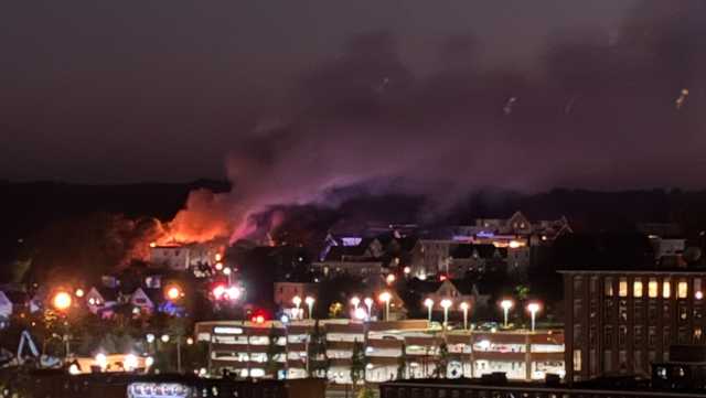 Fire crews battle 2nd alarm fire in Manchester