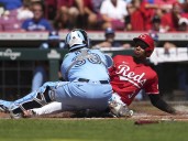 Marte hits walk-off single after Reds lose tying run on lodged ball, Cincinnati tops Blue Jays 5