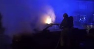 Crews descend as car 'set alight' on Greater Manchester street