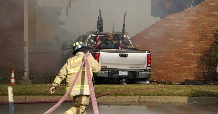 Michigan church murder suspect identified as ex-marine Thomas Jacob Sanford, accused of arson after shooting