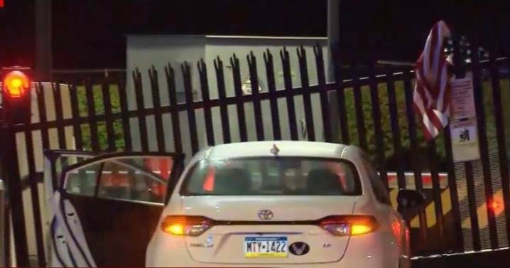 FBI entrance rammed by car 'with message' in 'act of terror' as manhunt launched