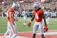 Sayin passes for 3 touchdowns, top-ranked Ohio State pulls away in second half to defeat Ohio 37
