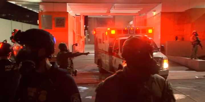 Federal agents delay ambulance leaving Portland ICE building with injured protester
