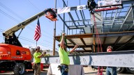 Last steal beam tops out new Lansing City Hall