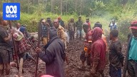 Rescuers scramble to recover bodies after landslide in Papua New Guinea