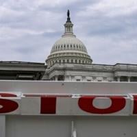 Asian stocks mixed, Wall St futures drop as US heads for shutdown