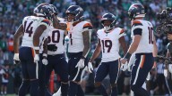 Broncos storm back from down 14 in fourth quarter to beat Eagles, 21
