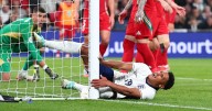 Aston Villa star Ollie Watkins left in agony after colliding with post during England clash