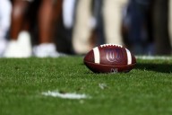 NCAA ordered to pay $18M to former football player and wife in concussion lawsuit