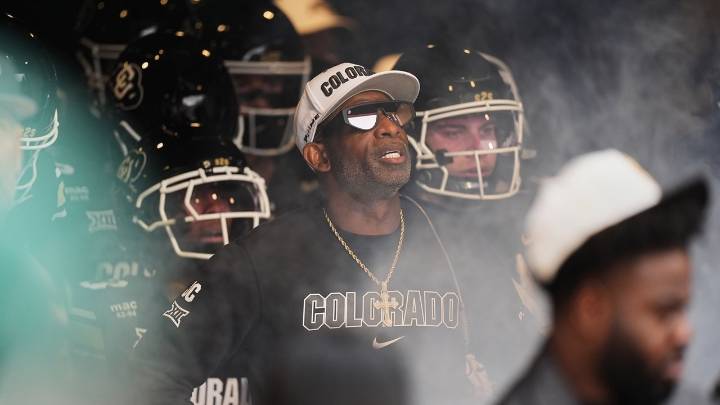 Colorado fans storm field after win over No. 22 Iowa State, Deion Sanders loves it but fine may loom