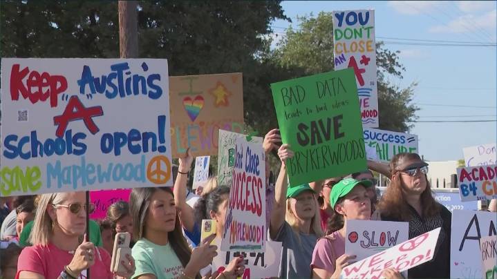 Families rally at Austin ISD headquarters to oppose school consolidations
