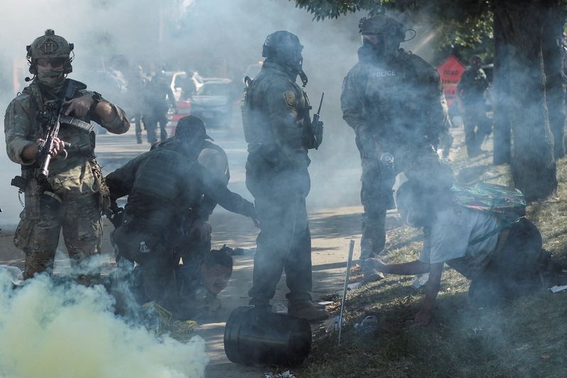 Border Patrol agents shoot woman in Chicago as protesters confront immigration personnel