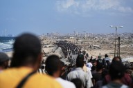 Gaza ceasefire takes hold as Israel begins troop withdrawal, Palestinians start returning home