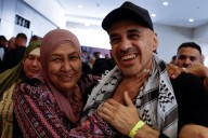 Palestinians cheer as freed prisoners begin to arrive home under ceasefire deal