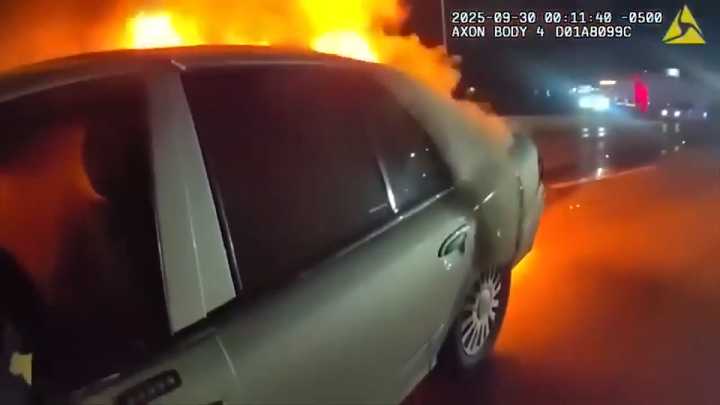 Video shows Dallas police officer rescue woman from burning car