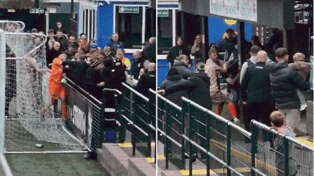 Goalkeeper punches rival fan as mass brawl erupts in front of young children at non